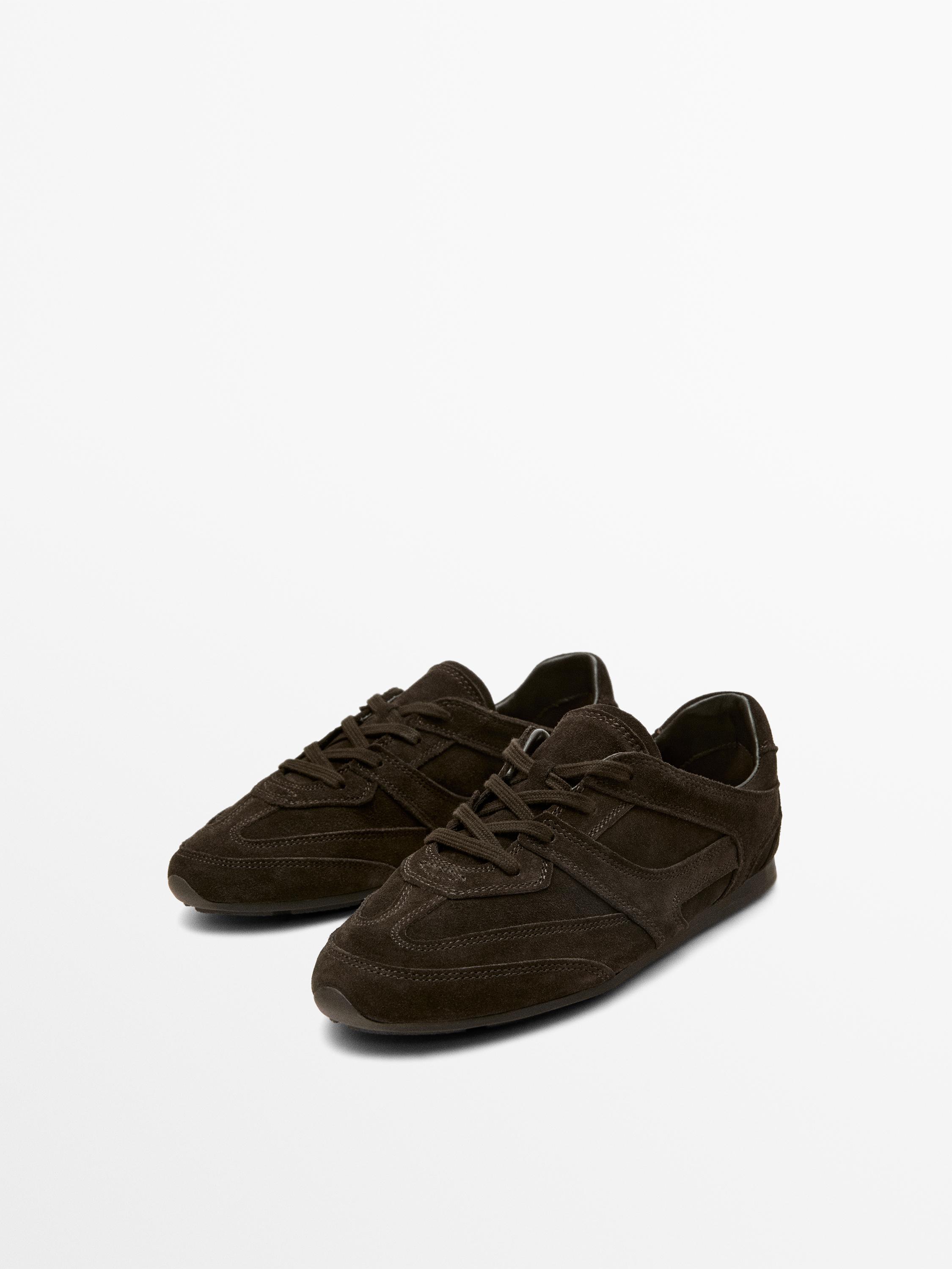 Split leather trainers with piece details